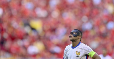 Kylian Mbappe of France looks up during a round of 16 match between France and Belgium at the Euro 2024 in Duesseldorf, Germany, Monday, July 1, 2024. (AP Photo)