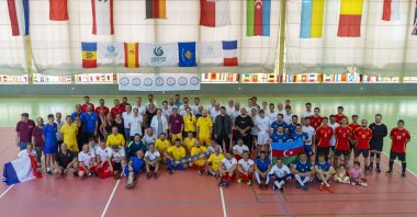 Teams pose for a group photo at the 21st Embassy Cup in Potsdam, Germany, July 4, 2024. (Photo Courtesy of YEE)
