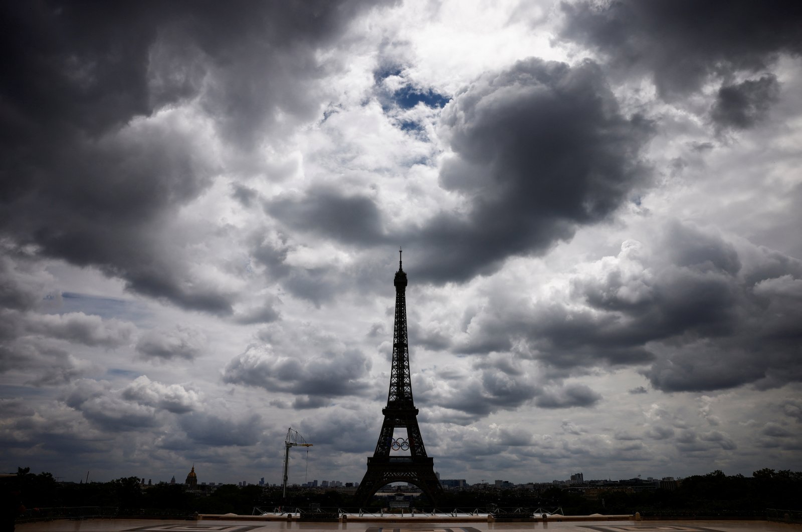 The Eiffel Tower with the Olympic rings displayed on the first floor is pictured from the Trocadero square in Paris, France, July 3, 2024. (Reuters Photo)