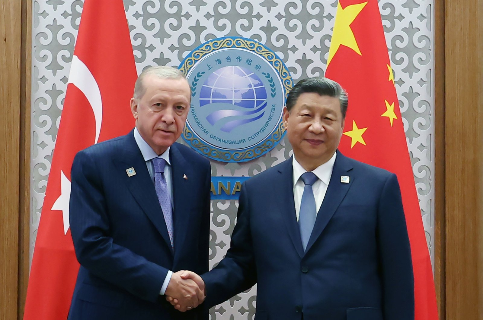 President Recep Tayyip Erdoğan (L) shakes hands with Chinese President Xi Jinping during their meeting, Astana, Kazakhstan, July 4, 2024. (AA Photo)