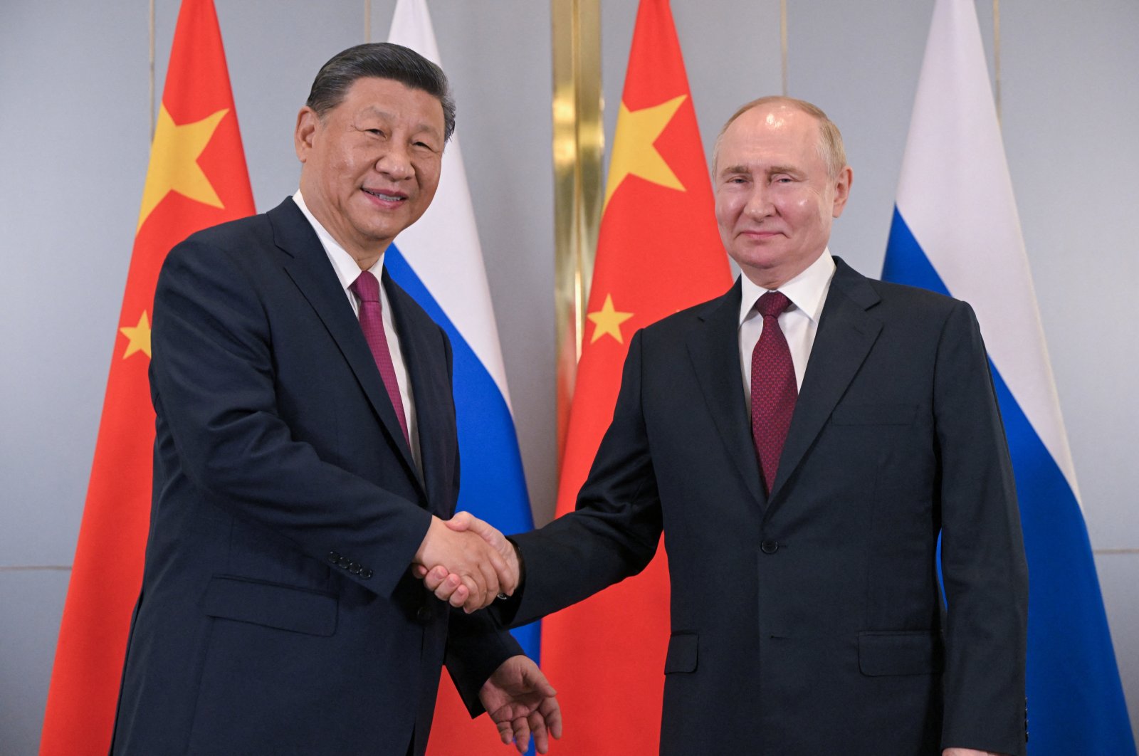 Russian President Vladimir Putin and Chinese President Xi Jinping shake hands during a meeting on the sidelines of the Shanghai Cooperation Organization (SCO) summit in Astana, Kazakhstan, July 3, 2024. (Reuters Photo)