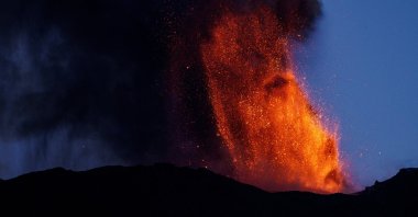 Lava and smoke rise from a crater of Mount Etna, Europe&#039;s most active volcano, Italy, July 4, 2024. (Reuters Photo)