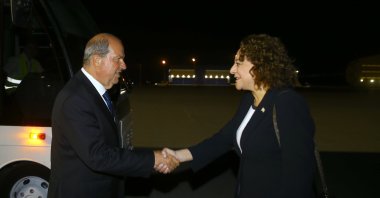 TRNC President Ersin Tatar (L) shakes hands with his country&#039;s representative in Baku, Ufuk Turganer (R), as he arrives at the Heydar Aliyev International Airport, Azerbaijan, July 4, 2024, (AA Photo)