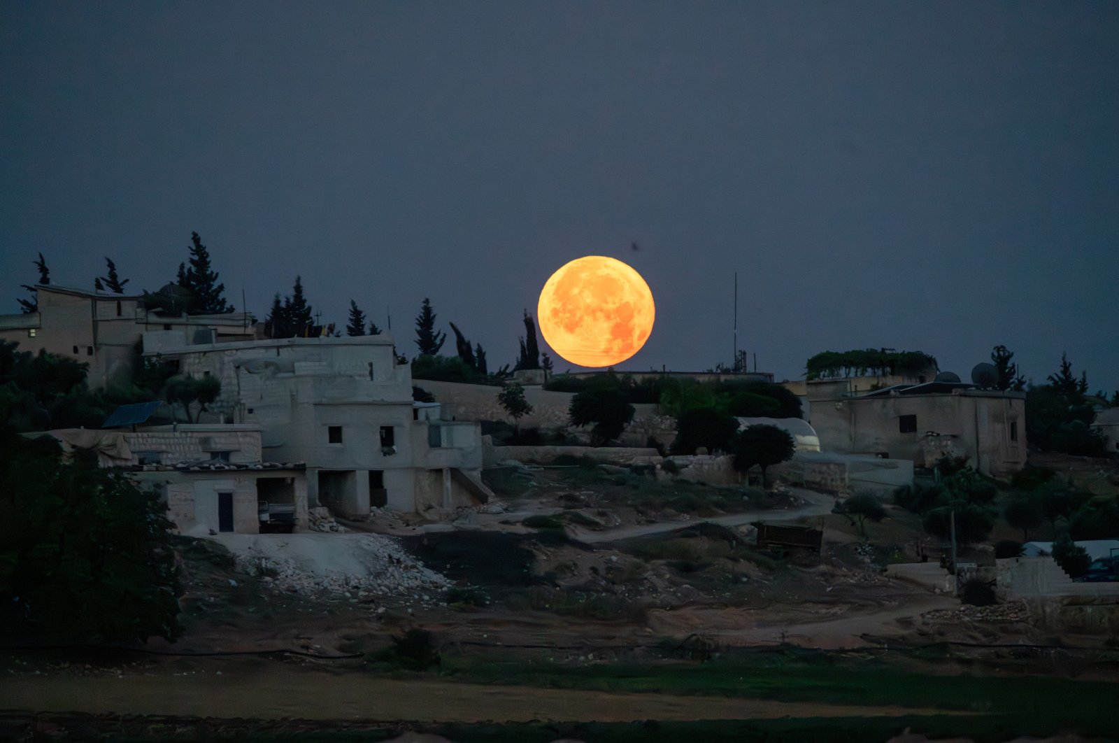 The full moon, also known as the "strawberry moon," is seen in the sky over Aleppo, northwestern Syria, June 21, 2024. (Getty Images Photo)