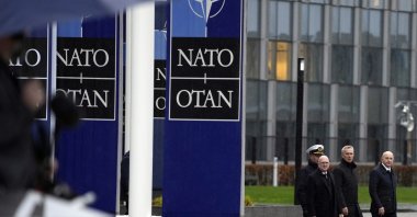 NATO Secretary General Jens Stoltenberg, second right, arrives for a wreath-laying ceremony at NATO headquarters in Brussels, on April 4, 2024. (AP File Photo)