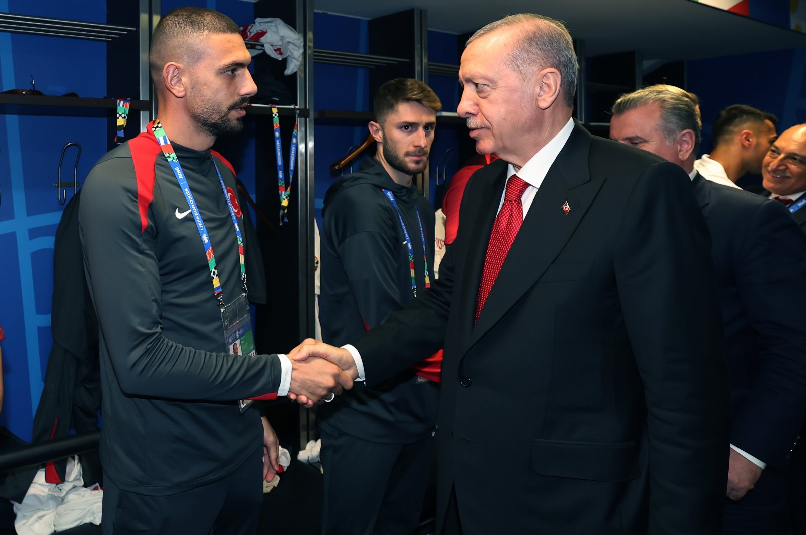 Turkish President Recep Tayyip Erdoğan shakes hand with national footballer Merih Demiral, in Berlin, Germany, July 6, 2024. (DHA Photo)