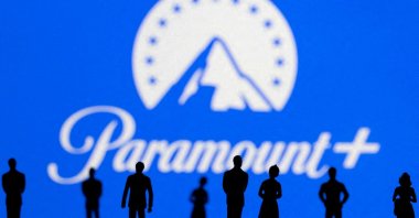 Toy figures of people are seen in front of the displayed Paramount   logo, in this illustration taken Jan. 20, 2022. (Reuters Photo)