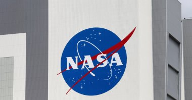 The NASA logo is seen at Kennedy Space Center ahead of the NASA/SpaceX launch of a commercial crew mission to the International Space Station, Cape Canaveral, Florida, U.S., April 16, 2021. (Reuters Photo)