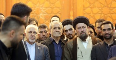  Iranian elected president Masoud Pezeshkian (C) arrives with Hasan Khomeini (R) the grandson of Ayatollah Ruhollah Khomeini, and former Iranian foreign minister Mohammad Javad Zarif (L), to talk to the media following winning the presidential elections, at the Khomeini shrine in southern Tehran, Iran, July 6, 2024. (EPA Photo)
