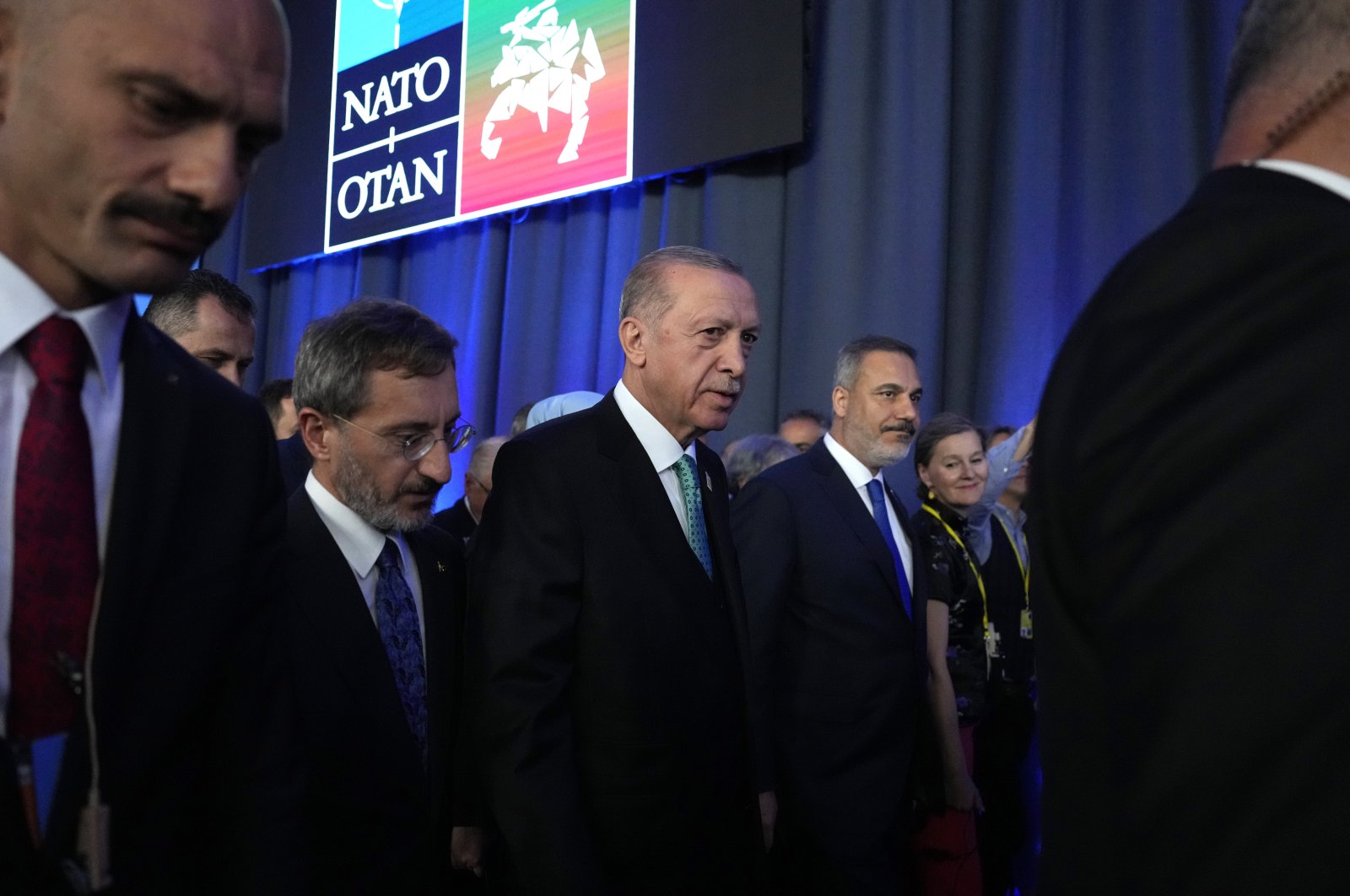 President Recep Tayyip Erdoğan (C) leaves after addressing a news conference at a NATO summit, Vilnius, Lithuania, July 12, 2023. (AP Photo)