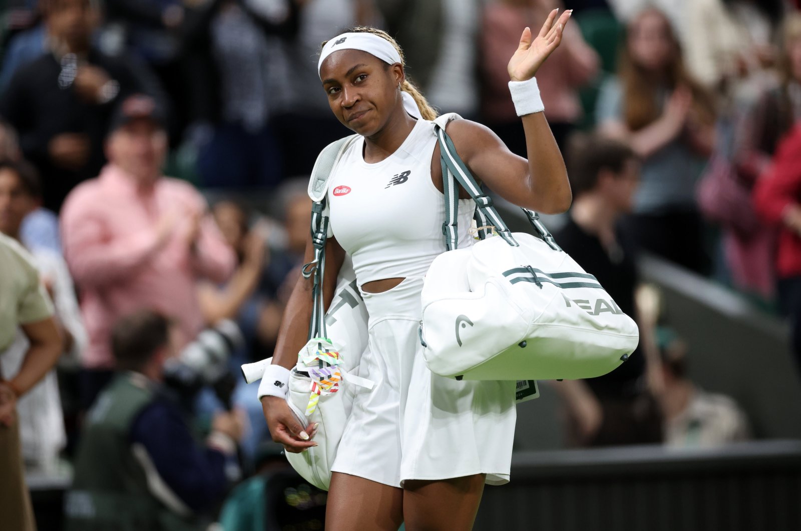 U.S.&#039; Coco Gauff greets the crowd as she leaves the pitch after losing to Emma Navarro during their round of 16 match at the Wimbledon Championships, Wimbledon, London, U.K., July 7, 2024. (EPA Photo)