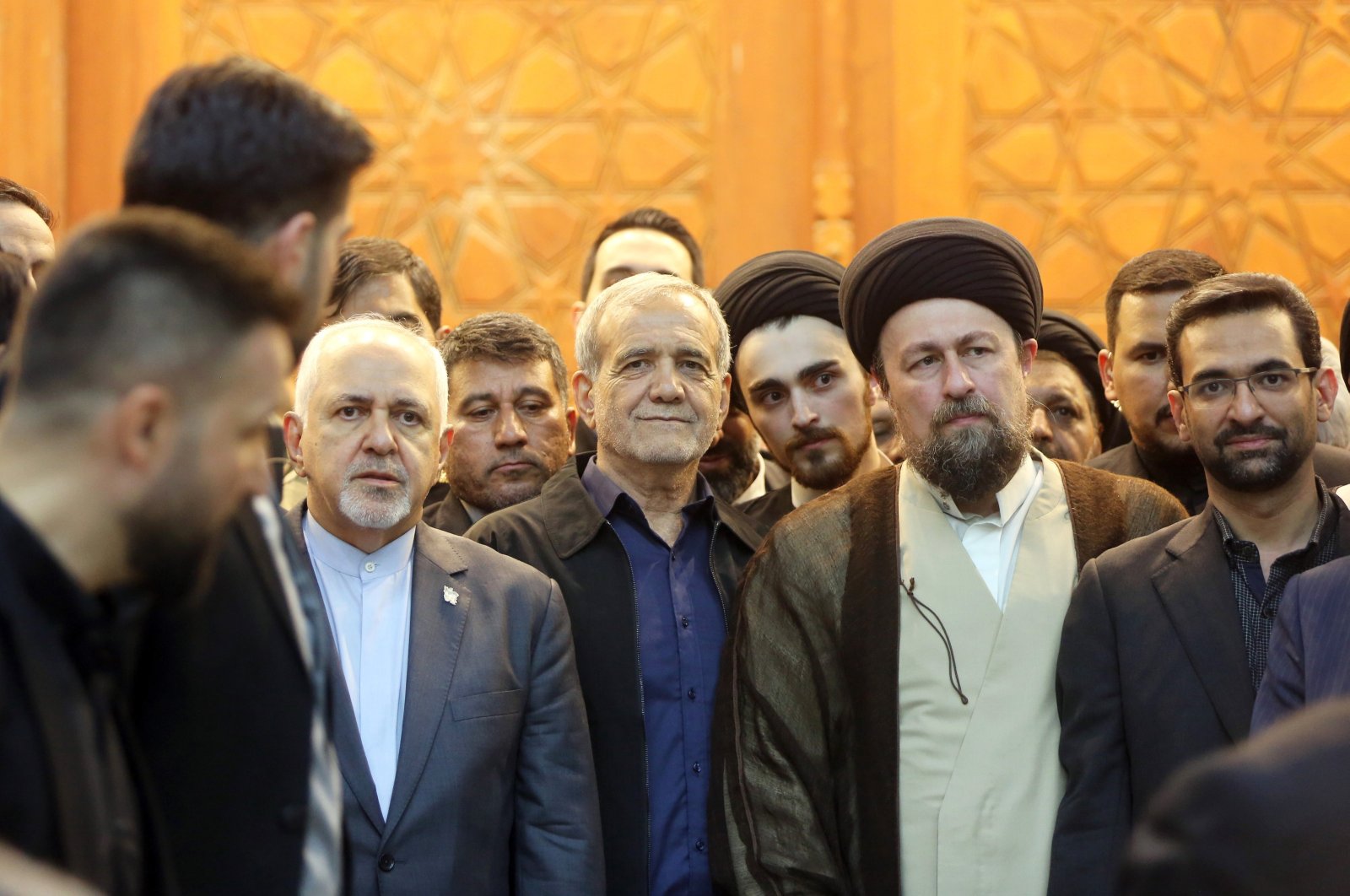  Iranian elected president Masoud Pezeshkian (C) arrives with Hasan Khomeini (R) the grandson of Ayatollah Ruhollah Khomeini, and former Iranian foreign minister Mohammad Javad Zarif (L), to talk to the media following winning the presidential elections, at the Khomeini shrine in southern Tehran, Iran, July 6, 2024. (EPA Photo)