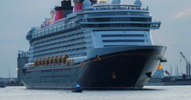 Disney Dream, a Disney Cruise Lines&#039; ship, sails to the Bahamas on the first Disney cruise for paying customers since they were stopped during the coronavirus pandemic, Port Canaveral, Florida, U.S., Aug. 9, 2021. (Reuters Photo)