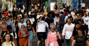 People walk in the Kızılay district of Ankara, Türkiye, June 2, 2022. (Getty Images Photo)