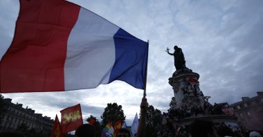 People gather on the Republique plaza following the second round of the legislative elections, Paris, France, July 7, 2024. (AP Photo)