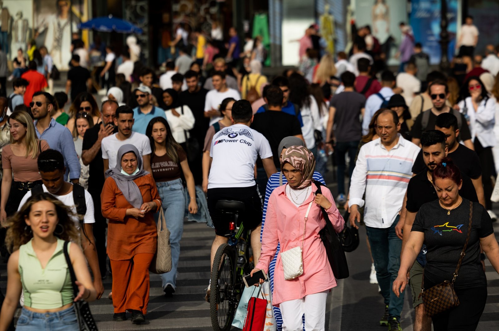 People walk in the Kızılay district of Ankara, Türkiye, June 2, 2022. (Getty Images Photo)