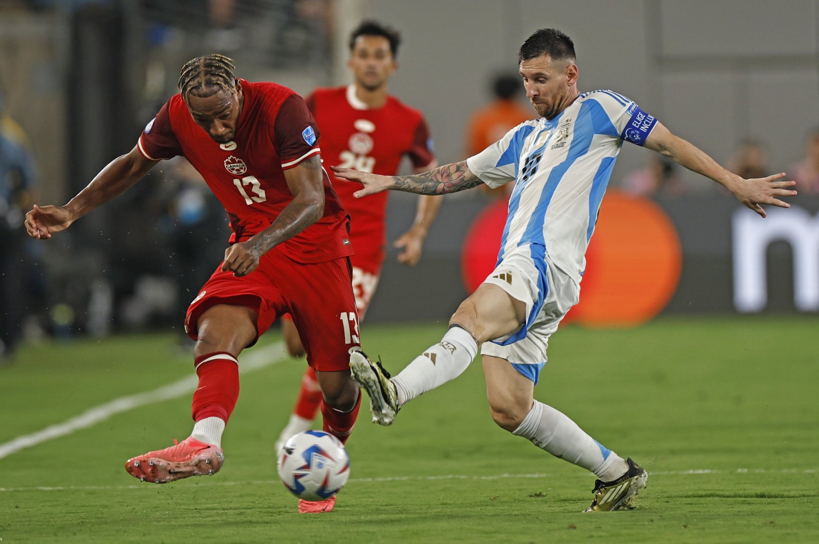 Argentina&#039;s Lionel Messi (R) in action with Canada&#039;s Derek Cornelius during the CONMEBOL Copa America 2024 semi-finals match between Argentina and Canada, East Rutherford, New Jersey, U.S., July 9, 2024. (EPA Photo)