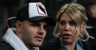 Mauro Icardi (L) and his wife Wanda Nara attend the UEFA Europa League Round of 32 Second Leg match between Inter Milan and SK Rapid Wien, Milan, Italy, Feb. 21, 2019. (Getty Images Photo)