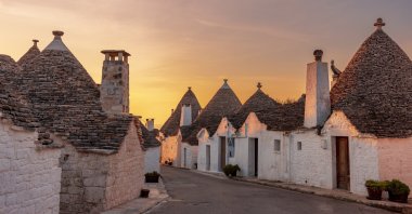 Typical white houses in Alberobello called Trulli at sunrise, Puglia, Italy, Febr. 17, 2023. (Getty Images)