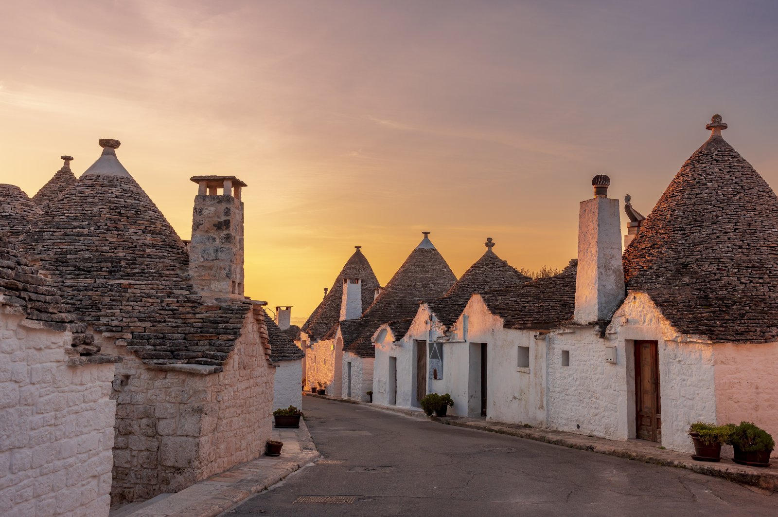 Typical white houses in Alberobello called Trulli at sunrise, Puglia, Italy, Febr. 17, 2023. (Getty Images)