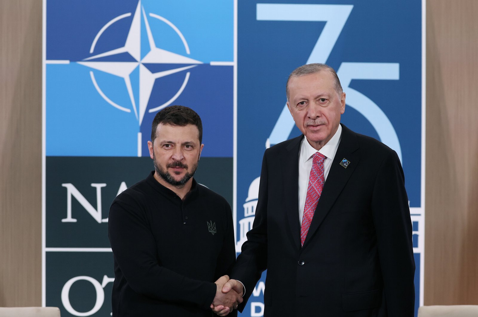 President Recep Tayyip Erdoğan and Ukrainian President Volodymyr Zelenskyy shake hands in Washington, D.C., July 11, 2024. (AA Photo)