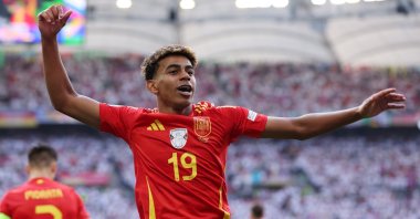 Spain's Lamine Yamal celebrates after teammate Dani Olmo scores his team's first goal during the UEFA EURO 2024 quarterfinal match between Spain and Germany at Stuttgart Arena, Stuttgart, Germany, July 5, 2024. (Getty Images Photo)
