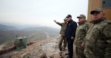 Then-Defense Minister Hulusi Akar (C) and then-Chief of Staff Yaşar Güler (R-2) watch as the Turkish military units near the border with Iraq carry out Operation Claw-Lock, April 24, 2022. (DHA Photo)
