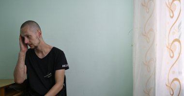 Ukrainian convict Arthur Kachurovsky gestures during a Agence France-Presse (AFP) interview at the Boryspil penal colony outside the town of Boryspil, Kyiv, Ukraine, July 4, 2024. (AFP Photo)