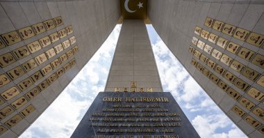 The pictures and names of those who fought against the 2016 coup attempt are inscribed on a monument outside the Presidential Complex, Ankara, Türkiye, July 14, 2024. (AA Photo)