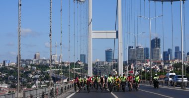 Cyclists ride across the July 15 Martyrs&#039; Bridge to the July 15 Martyrs&#039; Monument in a display of solidarity, Istanbul, Türkiye, July 14, 2024. (AA Photo)