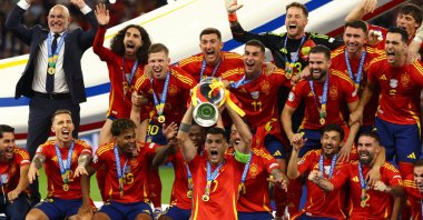 Spain's Alvaro Morata lifts the trophy as they celebrate after victory during the UEFA Euro 2024 final match between Spain and England, Berlin, Germany, July 14, 2024. (Reuters Photo)