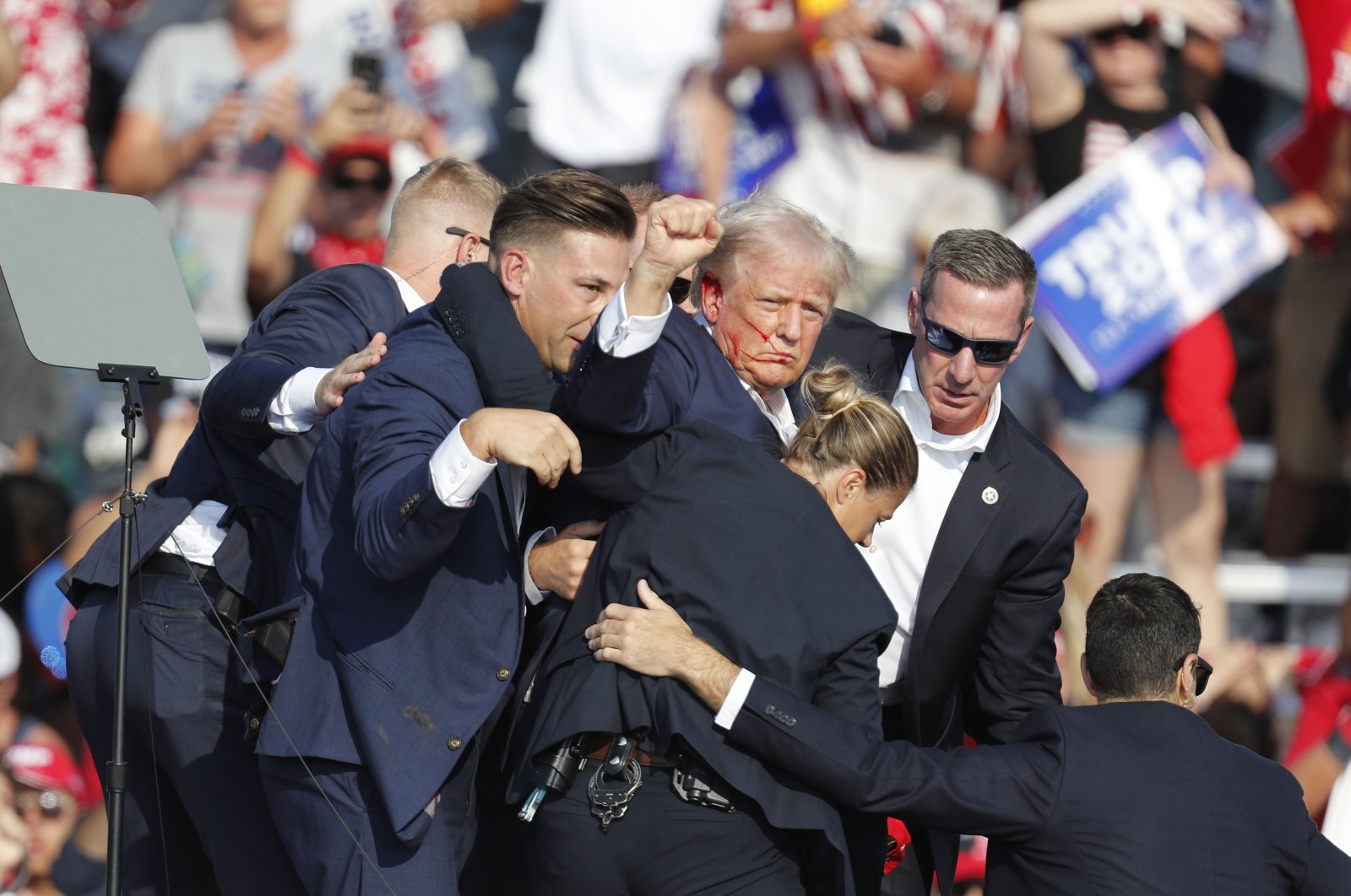 Former U.S. President Donald Trump is rushed off stage by Secret Service officers after being shot at during a campaign rally at the Butler Farm Show Inc. in Butler, Pennsylvania, U.S., July 13, 2024. (EPA Photo)