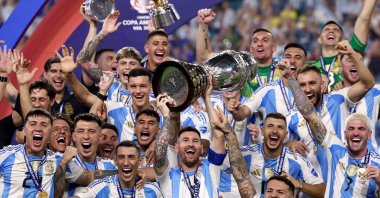 Argentina's Lionel Messi lifts the trophy as he celebrates with teammates after winning Copa America following a 1-0 win over Colombia at the Hard Rock Stadium, Miami, Florida, U.S., July 15, 2024. (Reuters Photo)
