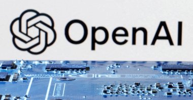 The OpenAI logo is seen near the computer motherboard in this illustration taken on Jan. 8, 2024. (Reuters Photo)