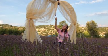 Visitors delight in their time amid the lavender fields of Mersin, Türkiye, July 15, 2024. (IHA Photo)