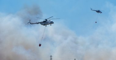 Turkish firefighter helicopters transport water to fight forest fires, Izmir, Türkiye, July 10, 2024. (AA Photo)