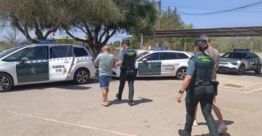 Spanish Civil Guard officers arrest two defendants during an operation in which Spanish Security Forces arrested a leader of PKK in Palma de Mallorca, Majorca island, eastern Spain, July 15, 2024. (EPA Photo)