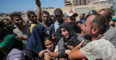 A Palestinian family mourns after their relative was killed following an Israeli airstrike in the al-Mawasi area of Khan Younis, Gaza Strip, Palestine, July 13, 2024. (EPA Photo)