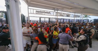 Fans rush the gates before the Copa America Final match between Argentina and Colombia at Hard Rock Stadium, Miami, U.S., July 14, 2024. (Reuters Photo)