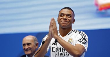 New Real Madrid signing Kylian Mbappe speaks to the crowd during the presentation at the Santiago Bernabeu, Madrid, Spain, July 16, 2024. (Reuters Photo)