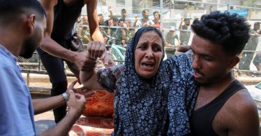 A Palestinian woman wounded in an Israeli strike is rushed into Al-Nasser Hospital following an Israeli strike, Gaza Strip, Palestine, July 16, 2024. (Reuters Photo)