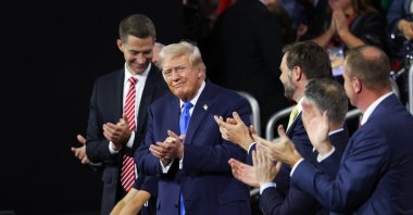 Republican presidential nominee and former U.S. President Donald Trump and Republican vice presidential nominee J.D. Vance applaud on Day 2 of the Republican National Convention (RNC), at the Fiserv Forum, Milwaukee, Wisconsin, U.S., July 16, 2024. (Reuters Photo)