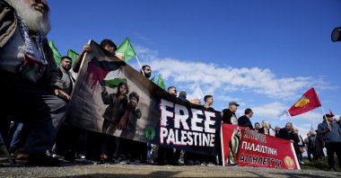 Demonstrators condemn Israel in a protest outside British base RAF Akrotiri in Limassol, Cyprus, Jan. 14, 2024. (AP Photo)