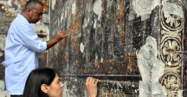 The damage caused by previous visitors to the frescoes is being repaired using undertone (authentic coloring) and "acqua sporca" (dirty water) techniques, Trabzon, Türkiye, July 14, 2024. (AA Photo)