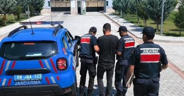 Gendarmerie officers escort a convicted FETÖ fugitive in central Aksaray province, Türkiye, July 16, 2024. (AA Photo)