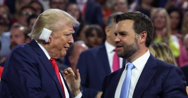 Republican nominees Donald Trump and J.D. Vance interact on Day 1 of the RNC at the Fiserv Forum in Forum in Milwaukee, Wisconsin, U.S., July 15, 2024. (Reuters Photo)