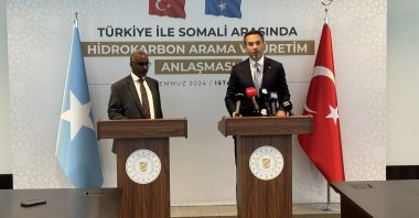 Energy and Natural Resources Minister Alparslan Bayraktar (R) and Somali Petroleum and Mineral Resources Minister Abdirizak Omar Mohamed during a ceremony on hydrocarbon cooperation, Istanbul, Türkiye, July 18, 2024. (IHA Photo)
