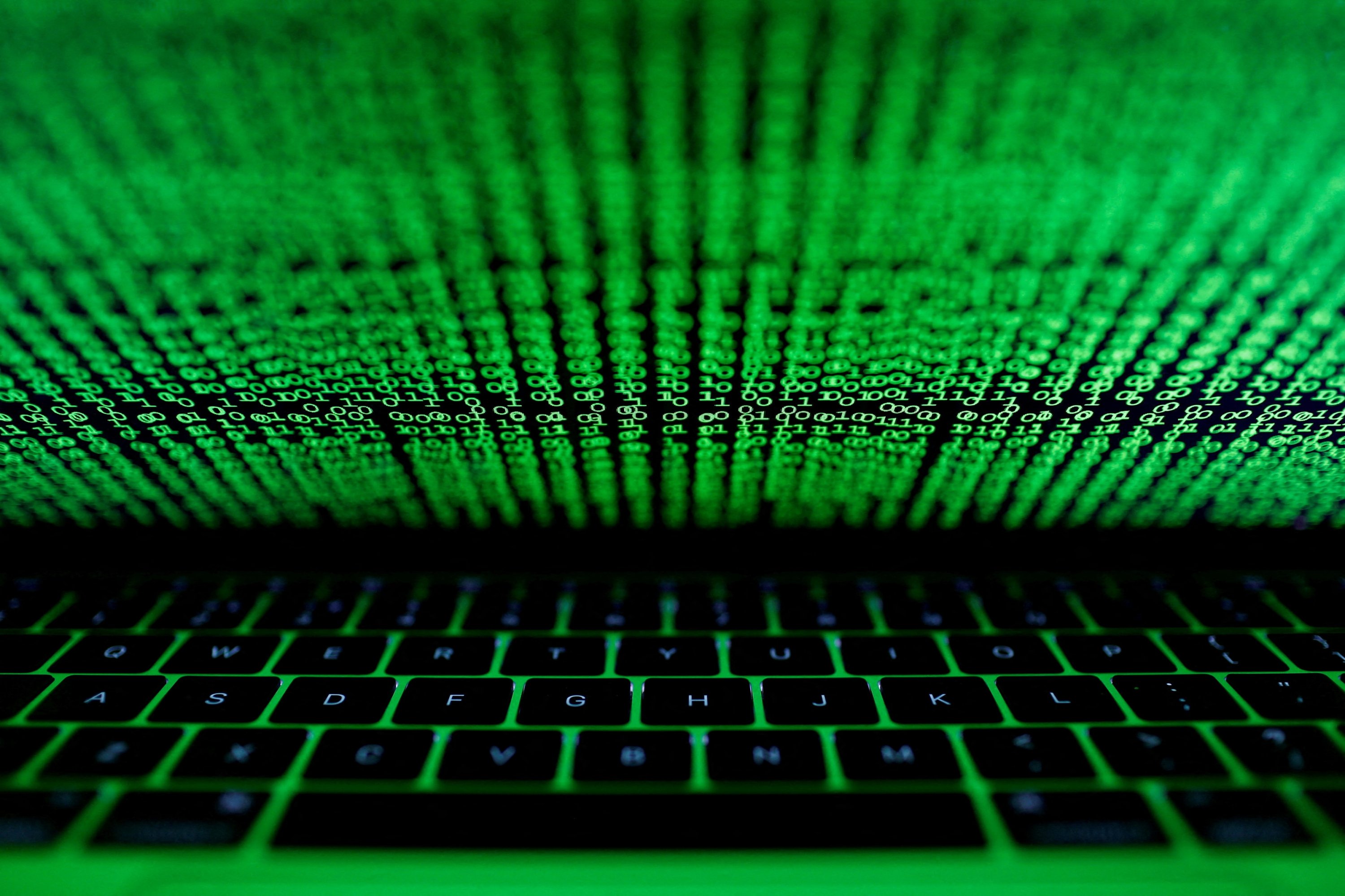 A computer keyboard lit by a displayed cyber code is seen in this illustration picture taken on March 1,  2017. (Reuters Photo)