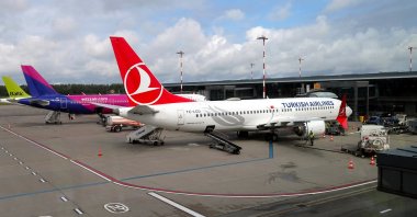 A Turkish Airlines Boeing 737 Max 8 (R), Wizz Air Airbus A321-271NX (C) and airBaltic aircraft are seen at Riga Airport in Riga, Latvia, July 3, 2024. (EPA Photo)