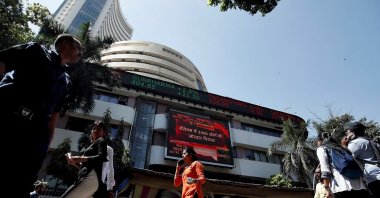 People walk past the Bombay Stock Exchange (BSE) building in Mumbai, India, March 9, 2020. (Reuters Photo)